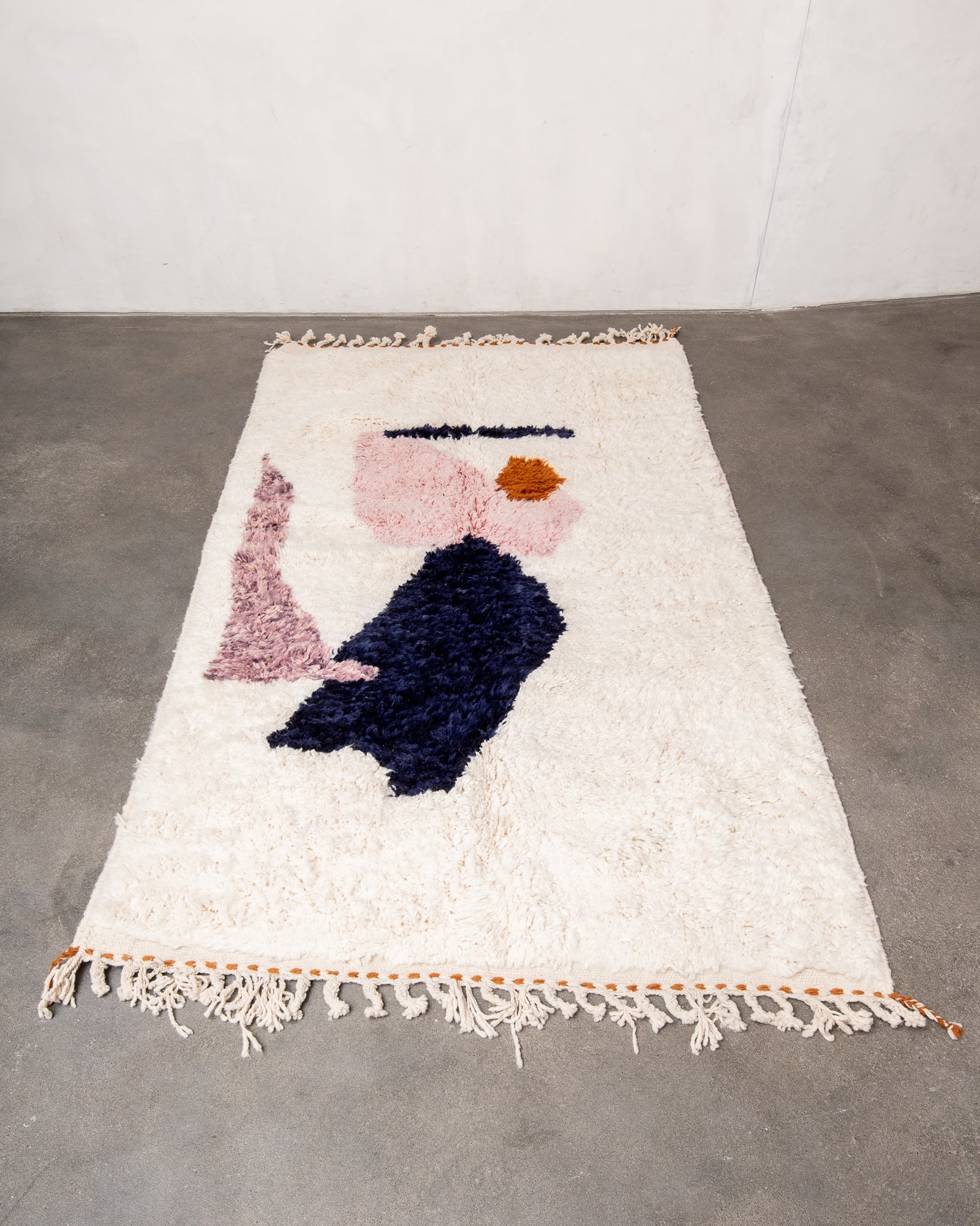 Modern, designer, handcrafted Berber rug from Morocco. Beniourain carpet with beautiful colours and patterns and fluffy wool texture.